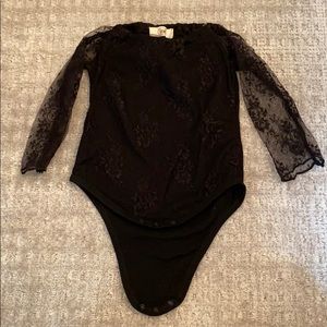 NWOT black lace bodysuit with sheer sleeves!